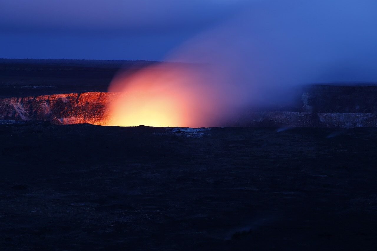 A fire is burning in the middle of a field.